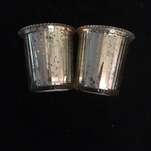 2 silver glass votives.